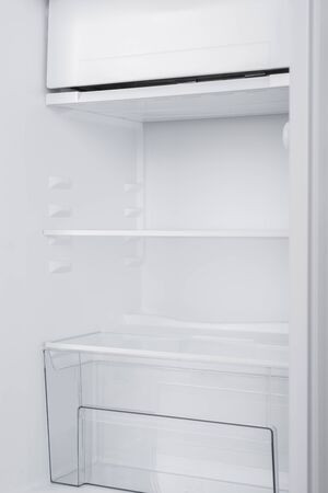 New Refrigerator Isolated on White Background. Modern Kitchen and Domestic Major Appliancesの写真素材