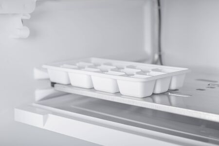 New Refrigerator Isolated on White Background. Modern Kitchen and Domestic Major Appliancesの写真素材