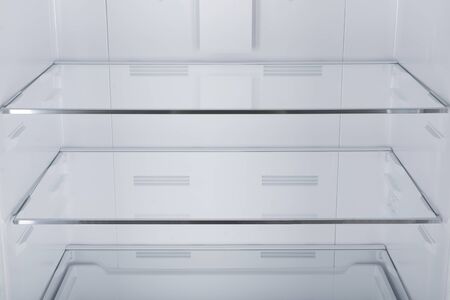 New Refrigerator Isolated on White Background. Modern Kitchen and Domestic Major Appliancesの写真素材