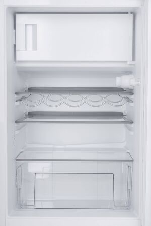 New Refrigerator Isolated on White Background. Modern Kitchen and Domestic Major Appliancesの写真素材