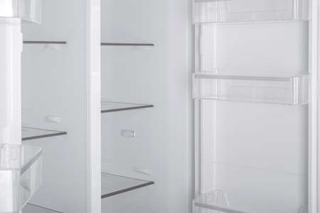 New Refrigerator Isolated on White Background. Modern Kitchen and Domestic Major Appliancesの写真素材