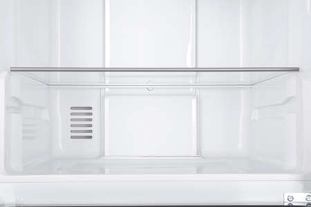 New Refrigerator Isolated on White Background. Modern Kitchen and Domestic Major Appliancesの写真素材