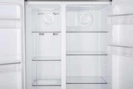 New Refrigerator Isolated on White Background. Modern Kitchen and Domestic Major Appliancesの写真素材