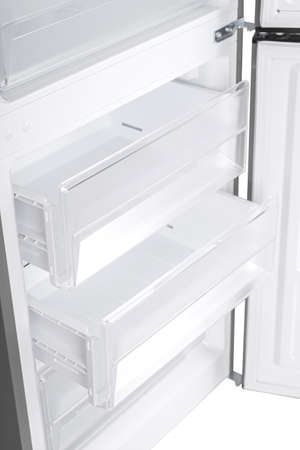 New Refrigerator Isolated on White Background. Modern Kitchen and Domestic Major Appliancesの写真素材