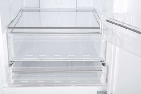 New Refrigerator Isolated on White Background. Modern Kitchen and Domestic Major Appliancesの写真素材