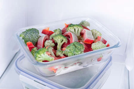 Open fridge full of fresh fruits and vegetables, healthy food background, organic nutrition, health care, dieting conceptの写真素材