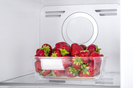 Open fridge full of fresh fruits and vegetables, healthy food background, organic nutrition, health care, dieting conceptの写真素材