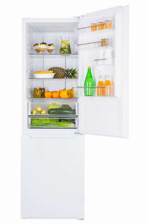 Open fridge full of fresh fruits and vegetables, healthy food background, organic nutrition, health care, dieting conceptの写真素材