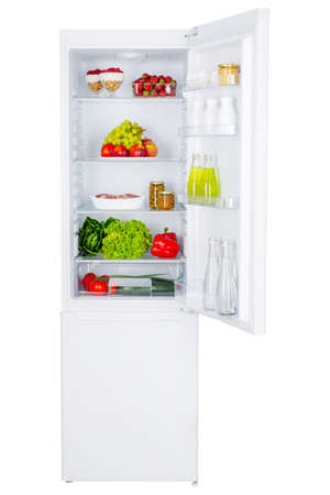 Open fridge full of fresh fruits and vegetables, healthy food background, organic nutrition, health care, dieting conceptの写真素材