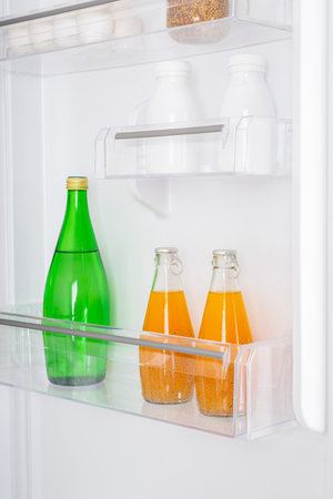 Open fridge full of fresh fruits and vegetables, healthy food background, organic nutrition, health care, dieting conceptの写真素材