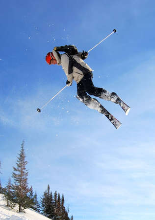Skier jumping freestyle high in the air Skier jumping freestyle high in the air