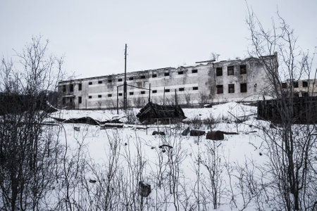 Exterior of old decayed abandoned prison in Kolymaの写真素材