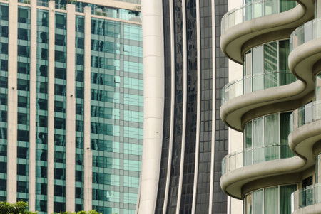 Mirrored walls of big skyscrapers Abstract city background.