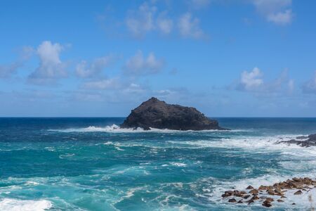 A powerful storm in the Atlantic Ocean in a bay on the coast of Tenerife. Spain