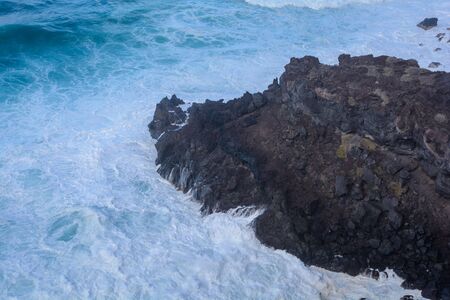 A powerful storm in the Atlantic Ocean in a bay on the coast of Tenerife. Spainの写真素材