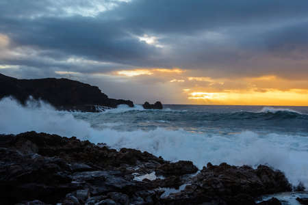 A powerful storm in the Atlantic Ocean in a bay on the coast of Tenerife.の写真素材
