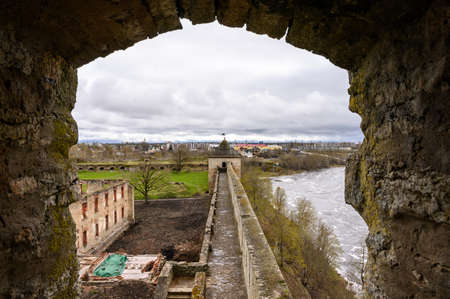 View from the fortress wall to Ivangorod. Ivangorod fortress. Old fortress walls. Historical sites.