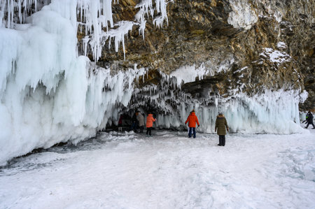 ice caves of Lake Baikal. Frozen icicles and splashes. Frozen lake Baikal in winter in Russia