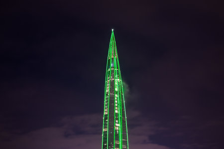 A cloud caught on a skyscraper. The Lakhta Center building turned into a New Year tree. St. Petersburg, Russia.の写真素材