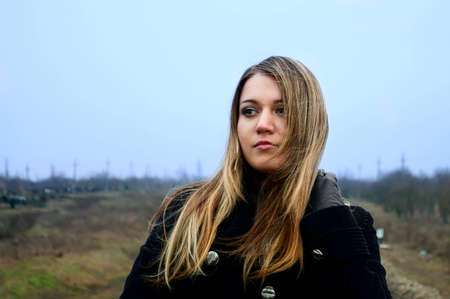 Portrait of the young thoughtful beautiful girlの写真素材