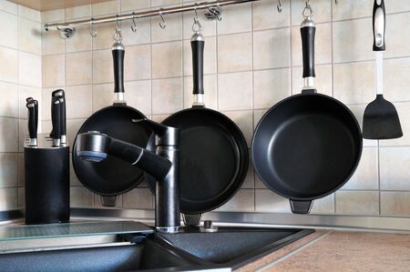 view of kitchen utensils over the washstandの写真素材