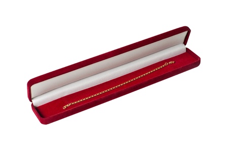 isilated gold bracelet in a red boxの写真素材
