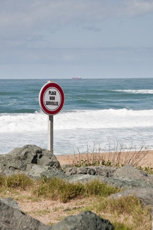 French warning sign on a beachの写真素材