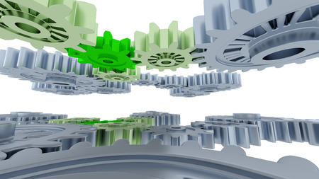 Between Silver and Light Green Gears with Small Green Gears with a white backgroundの写真素材