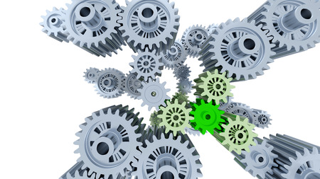 Many Metallic Gears with Some Green and Light Green Pieces with a white backgroundの写真素材