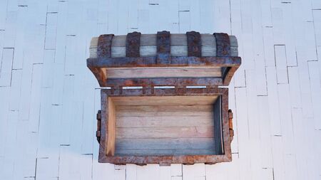 Top view of an old wood with rusty metal Chest Open and empty put on a white wood floor