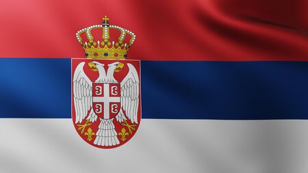 Large Flag of Serbia fullscreen background in the wind with wave patternsの写真素材