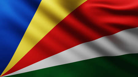 Large Flag of Seychelles fullscreen background in the wind with wave patternsの写真素材