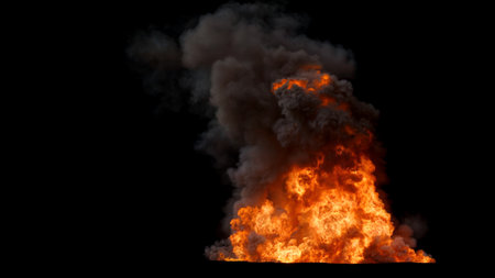 Large intense Fire with dark and dense Smoke rising into the air with Bright and Chaotic Flames showing Intense Burn on a Black Backgroundの写真素材