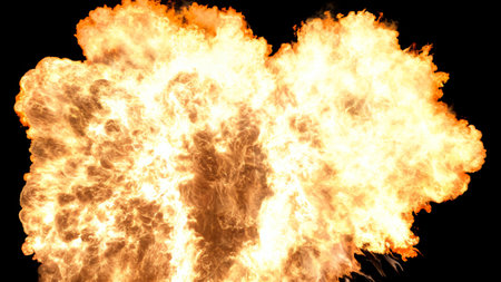 Large explosive orange and yellow fireball with bright fiery looks the flames are intense and spread widely indicating significant explosion or burst of energy on a black backgroundの写真素材