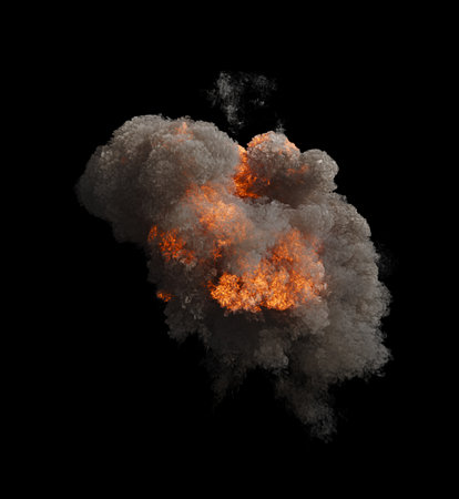 Isolated Large explosion with flames at its core and surrounded by thick and billowing dark smoke on a black backgroundの写真素材
