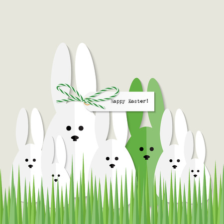 Greeting card with easter bunnies sitting in grassのイラスト素材