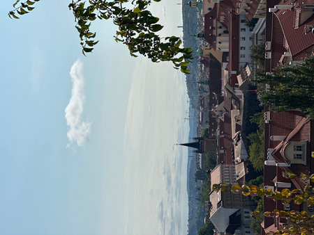 Prague, Czech Republic - September 16, 2025: Scenic panorama of Prague rooftops featuring historic buildings and a clear blue sky, capturing the essence of the cityの写真素材
