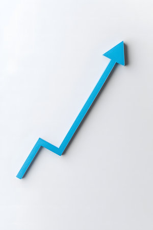Modern blue arrow representing upward growth and success, placed on a white background, emphasizing clarity and a sense of progress in visual communicationの素材