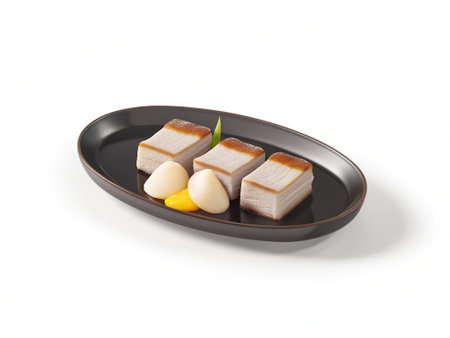 Japanese food, simmered mackerel on a black plate