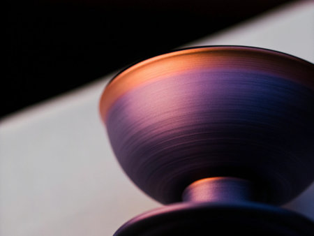 Closeup of a spinning top of a spinning top on a black background