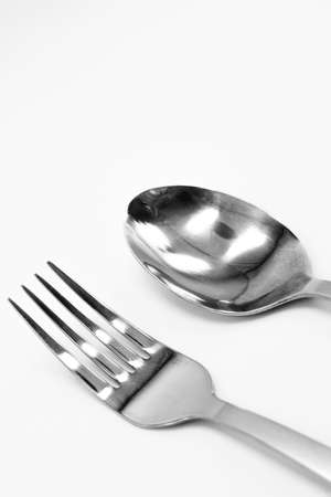 A set of cutlery from a fork, a spoon on a white background.の写真素材