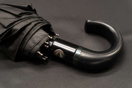 Classic black umbrella with premium leather handle