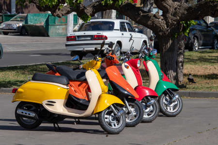 Several multi-colored mopeds - Ukraine, Odessa, 11,06,2020のeditorial素材
