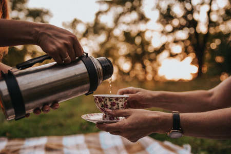 hand holding a bottle of water. Natureの写真素材