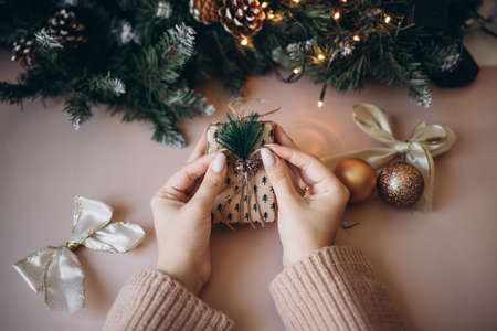 christmas gift in hand. New Yearの写真素材