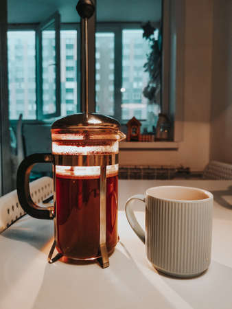 brewing coffee in a french press in the morningの写真素材