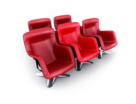 Five red chairs on white backgroundの写真素材