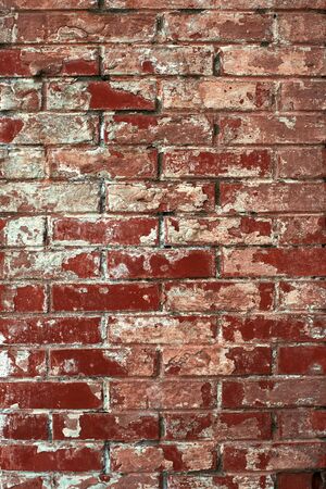 Red old worn brick wall texture background. Vintage effect.の写真素材