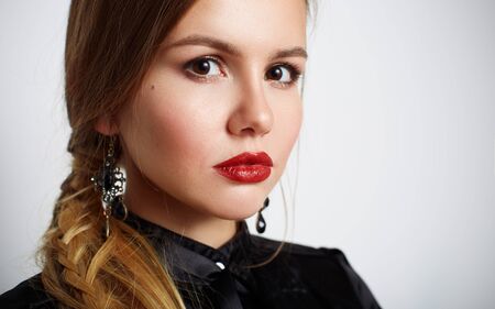 portrait of cute beautiful young girl with wonderful lipsの写真素材
