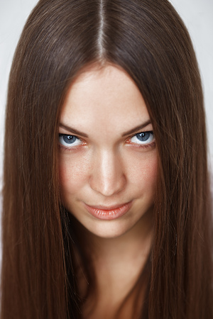 Portrait of a young girl with eyes like gimletsの写真素材